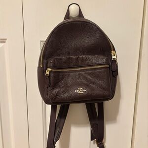 Coach Pebbled Leather Mini Backpack in Dark Brown